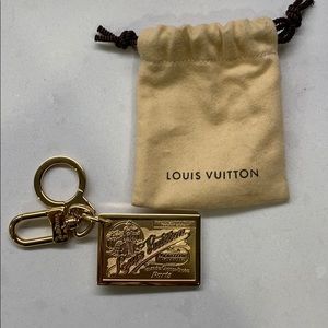 Louis Vuitton Gold Travelling Requisites keychain